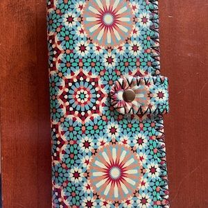 NWT. Spanish inspired wallet. Does have zippered coin slot.
